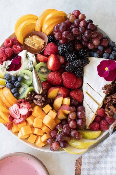 Everything you need to know for making an amazing fruit and cheese platter! Cheese and fruit platters are a great way to wow your guests while feeding them some universally loved food items. They're easy to assemble and look beautiful! #fruitcheeseplatter #fruit #cheeseplatter #entertaining #easyrecipes Fruit And Cheese Platter For Party, Beautiful Fruit Platter, Fruit And Cheese Tray, Fruit And Cheese Platter, Baking Lessons, Fruit Platters, Ladies Brunch, School Lunch Ideas, Dessert Platter