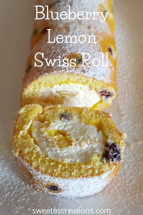 A soft sponge cake, baked with juicy blueberries, filled with lemon curd, and whipped cream. This melt in your mouth blueberry and lemon swiss roll cake will tik all the boxes. Lemon Swiss Roll, Japanese Roll Cake, Soft Sponge Cake, Sponge Cake Roll, Swiss Roll Cakes, Jelly Roll Cake, Benefits Of Lemon, Swiss Roll Cake, Cake Roll Recipes