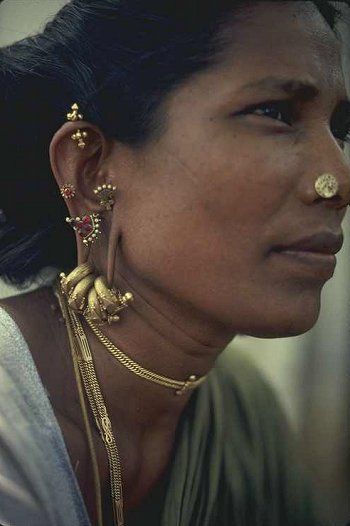 India |  Portrait of a village woman, with her lovely jewellery.  Photo taken in Madurai, Tamil Nadu. | Photographer unknown Madurai, Creative Rings, Rings Boho, Long History, Ear Rings, Tamil Nadu, Boho Rings, Gold Vermeil, Moonstone