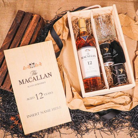 Our Personalised Macallan 12 Year Gift Set is the perfect keepsake for the Whiskey fanatic in your life. Rustic packaging and personalisation. Our Personalised Macallan 12 Year Gift Set contains: x1 70cl Macallan Whisky, x2 Larkfire Whisky Water 150ml Cans, x3 Whisky stones in a velvet pouch, x1 Whisky Glass (Choose from two styles), x1 Personalised Double Wooden Gift Box.Occasion: We think our Macallan 12 Year Whisky makes a great gift for Birthdays, Christmas, Fathers Day, Mothers Day or simpl Whisky Gift Set, Macallan Whisky, Rustic Packaging, Whisky Glass, Christmas Packaging, Velvet Pouch, Wooden Gifts, Fantastic Gifts, Creative Business