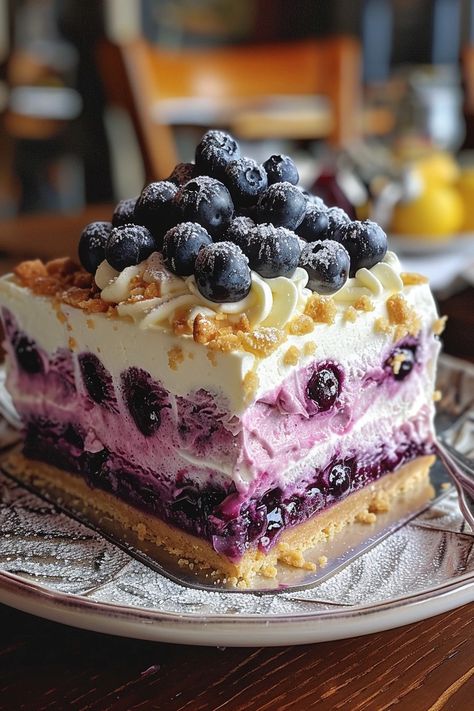 Lemon Blueberry Shortbread Mousse Cake: A Symphony of Flavors - MmmRecipes : Easy and Delicious Recipes Blueberry Lemon Cake Easy, Blueberry Lemon Mousse, Lemon Blueberry Shortbread Mousse, Blueberry Shortcake Recipe, Lemon Blueberry Filling, Lemon Blueberry Mousse Cake, Birthday Cake Easy Recipe, Lemon Blueberry Shortbread Mousse Cake, Lite Dessert Recipes