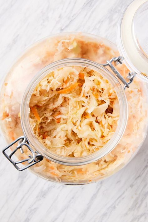 Sauerkraut is a great addition to so many types of meals and is simple to create at home. Homemade sauerkraut ferments over a few days and holds incredible taste while providing great probiotic benefits. Simply using kosher salt and cabbage, this sauerkraut comes together with minimal effort and equipment! | wyseguide.com #sauerkraut #preserving #summer #recipe #fermentation How Do You Make Saurkraut, Fermented Recipes, Make Sauerkraut, Traditional German Food, Cook Vegetables, Fermented Sauerkraut, Sauerkraut Recipe, Vegan Probiotics, Metabolic Health