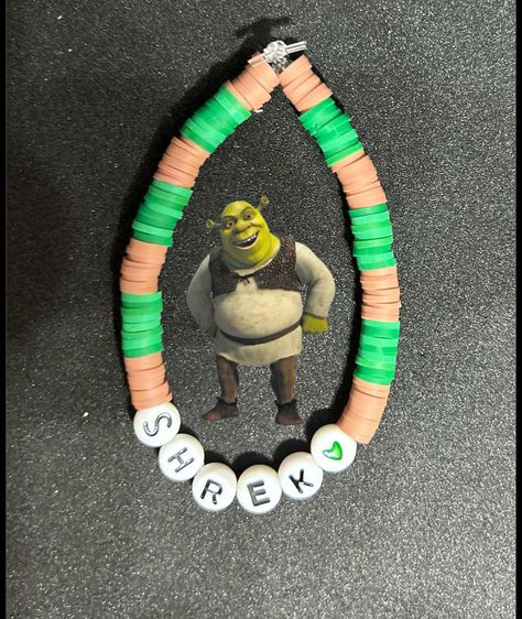 Shrek (Cartoon) Heishi Bracelet #handmadebracelet #heishibracelets #beadedbracelets #bracelets #etsyshop #etsyfinds #etsyseller #etsysellersofinstagram #shrek2 #shrek5 #shrekbracelet #shrekbracelet #shrekislife #shrekislove #shrekcosplay #shrekanddonkey #shrek3 #shrekanddonkey #shrekandfiona #shrek #cartoon #cartoonbracelets #cartoonbracelet Animal Jokes, Shrek Clay, Shrek Cartoon, Clay Bracelets, Heishi Bracelet, Bracelets Ideas, Clay Bracelet, Funny Animal Jokes, Shrek