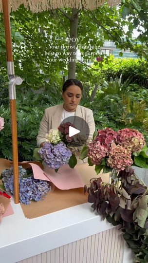 549K views · 81K reactions | 🌸 What is this? The Flower Wrapping Station is a service where our skilled florists transform your reception florals into charming mini bouquets for your guests to take home. 🌷 How does it work? 🎀 Our fairy-like florists revisit your venue two hours before the event concludes. They expertly wrap your existing florals into delightful mini bouquets. Guests can approach our florists with their own flowers, or our team can gather florals for them. 🌼🌿 👍 Should I add this service? Absolutely! Here are a few of the advantages of choosing this option: 🌟 Memorable Guest Experience: Elevate your wedding with an interactive Flower Wrapping Station, offering guests a unique and beautiful personalized memento. 📸 🌈 Photogenic Moments: Capture joyous interactions at Reception Florals, Mini Bouquets, Wrapping Station, Flower Wrapping, Guest Experience, Florist, Wedding Inspiration, How To Memorize Things, Flowers