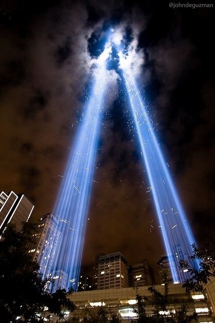 Night at Ground Zero.  I like to think the little white specks dancing in the light are the souls of those we lost telling us they are moving on and it's okay for us to start moving on, too. Natal, Ground Zero Nyc, Ground Zeroes, City At Night, Ground Zero, Safe Haven, Space Needle, God Bless, At Night