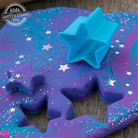 Galaxy Playdough - The Ultimate Glitter Playdough Recipe | Kids Activities Blog Galaxy Playdough, Galaxy Play Dough, Glitter Playdough, Galaxy In A Bottle, Homemade Glitter, Galaxy Crafts, Diy Playdough, Galaxy Slime, Playing With Slime