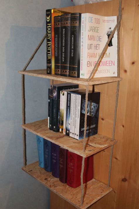 A cheap and easy DIY bookshelf. Fast build. Hangs from anywhere you like. #Hangingbookshelf  #Hanging  #Bookshelf  #Storage  #BookStorage #books #diy #crafts Diy Hanging Bookshelf, Easy Diy Bookshelf, Diy Bookshelf Ideas, Hanging Bookshelf, Hanging Bookshelves, Books Diy, Diy Bookshelf, Bookshelf Ideas, Book Cart