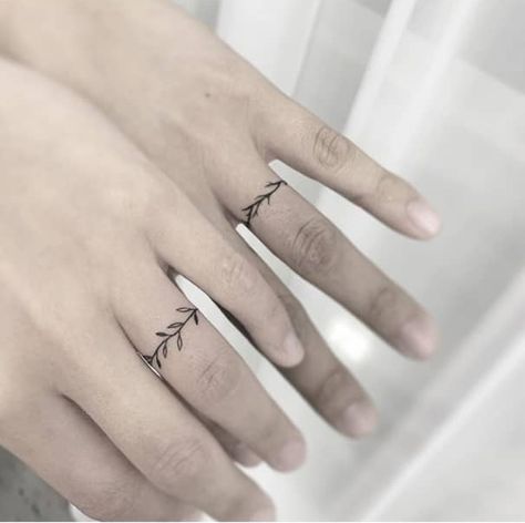 Ring tattoos are becoming a thing lately. They are great for couples. Couples get ring tattoos as a way to celebrate their anniversary Cute Ring Tattoos, Woman Ring Tattoo, His And Hers Ring Tattoos, Nature Ring Tattoo, Small Ring Tattoos, Ring Tattoo Designs For Couples, Ring Tattoo Couple, Finger Ring Tattoos For Women, Women’s Ring Tattoo