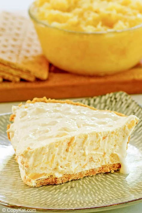 Million Dollar Pie gets its name from how good it tastes. See how easy it is to make this creamy pineapple icebox pie with only 5 simple ingredients; pineapple, condensed milk, cool whip, lemon, and graham cracker crust. A perfect dessert recipe for summer and easy entertaining. #pie #pineapple #easypierecipes #quickandeasy #dessertideas #pies #summerfood Million Dollar Pie, Cool Whip Pies, Graham Cracker Recipes, Recipe For Summer, Summer Pie, Icebox Pie, Pineapple Desserts, Lemon Bar, Graham Cracker Crust Pie