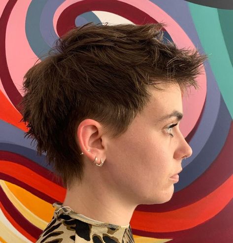 Feathered Pixie Cut for Round Face Shape Masculine Pixie Haircut, Short Haircuts Masculine, Masculine Pixie Cut, Short Punk Hair Pixie, Short Masc Haircuts, Short Hair With Undercut, Spiky Pixie Haircut, Round Face Short Haircuts, Cottagecore Hairstyles