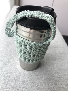 Stylish cup holder that is perfect for your office 🍵 Crochet Stanley Cup Holder, Cup Holder Crochet, Crochet Cup Holder, School Crochet, Crochet Coaster Pattern, Crochet Motif Patterns, Cup Cozy, Crochet Coasters, Cute Little Things