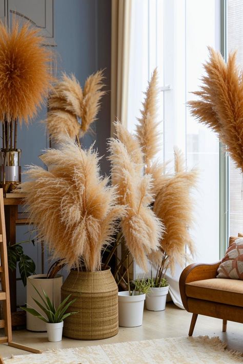 Bring the outdoors in! Transform your living room with pampas grass and lush plants. Create a cozy and inviting atmosphere with natural textures and vibrant greenery. Find inspiration for stunning arrangements and stylish decor ideas. Living Room Plants Decor, Room Oasis, Plant Styling, Lush Plants, Pampas Grass, Natural Texture, The Outdoors, Oasis, Lush