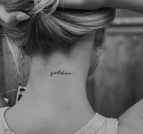 Women Word Tattoos, Golden Tattoo Word, Stay Golden Tattoo, Tattoo Ideas Writing, Small Neck Tattoos For Women, Golden Tattoo, Wrist Tattoos Words, Front Neck Tattoo, One Word Tattoos