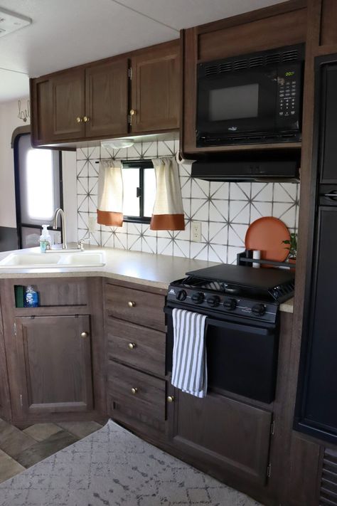 Camper Makeover - A girl and a glue gun Black Cabinets In Camper, Camper Cabinet Color Ideas, Camper Cabinet Colors, Painting Camper Walls, Camper Cabinet Redo, Tiny Camper Remodel, 5th Wheel Camper Remodel, Small Camper Makeover, Camper Cupboards