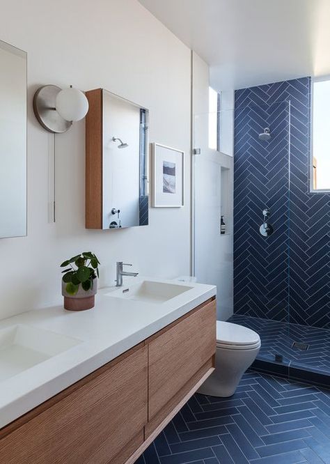 navy blue ceramic tile in herringbone pattern on bathroom wall and floor Makeover Kamar Mandi, Navy Bathroom, Blue Bathroom Decor, Interior Vintage, Bathroom Tile Designs, Blue Bathroom, Bathroom Floor Tiles, Ceramic Floor, Bathroom Tile