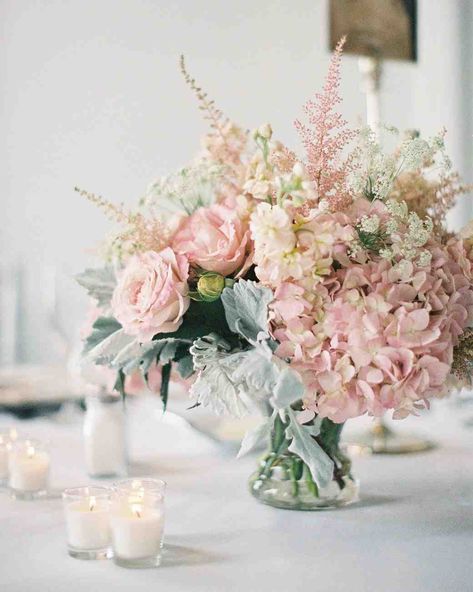 Pink Wedding Centerpieces We Love | Martha Stewart Weddings - The prettiest pastel wedding colors, in the form of mint-hued dusty miller, blush garden roses, and matching hydrangeas, bring spring vibes to this chic centerpiece. Graduation Reception, Centrepiece Ideas, Bouquet Pastel, Pink Wedding Centerpieces, Banquet Decor, Vintage Centerpieces, Pink Hydrangea, Ballroom Wedding, Vintage Inspired Wedding