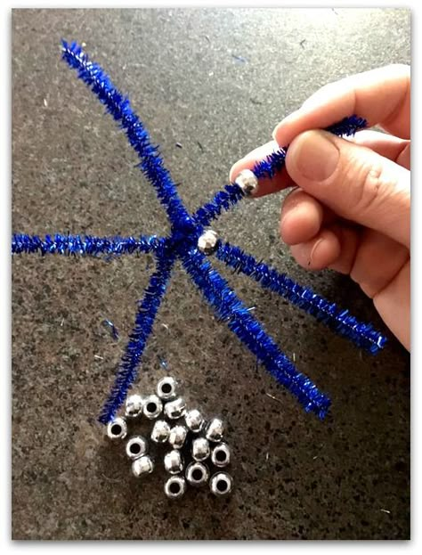 Beaded Pipe Cleaner Snowflakes - Easy Winter Craft! - My Bright Ideas Craft With Pipe Cleaners, Pipe Cleaner Snowflakes, Easy Winter Crafts, Beaded Snowflakes Ornament, Pony Bead Crafts, Christmas Snowflakes Ornaments, Beading For Kids, Pipe Cleaner Crafts, Beaded Snowflakes