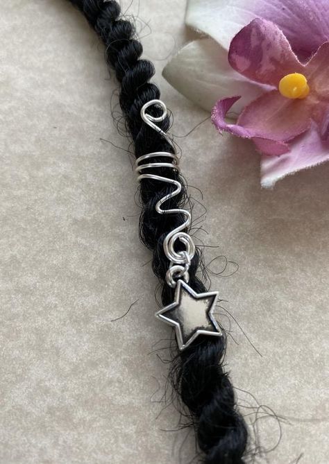 This is a silver coil/spiral dreadlock/braid/loc cuff/charm. It features a silver star dangling from the spiral.Opening/hole in coils as shown is 8mm. Made with 20g silver tarnish resistant wire. If you would prefer a different style of coil with this star charm, please convo me!If you need a different size opening, please add a note to seller at checkout with the size needed. All items are lead and nickel free. Braids Dreads, Hippie Braids, Dread Jewelry, Dread Braids, Dreadlock Jewelry, Braid Jewelry, Loc Jewelry, Braided Ring, Handmade Hair Accessories