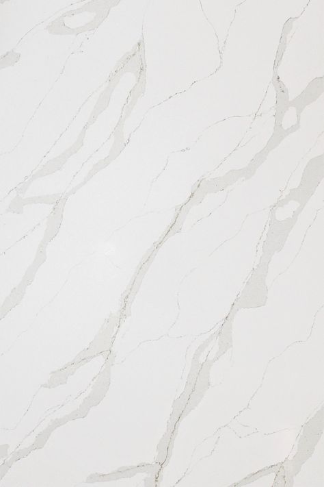 From far away, Calacatta Calypso white quartz might seem ordinary—a bright white background featuring classic grey marble veining in a soothing diagonal motion. Up close however, this white quartz holds a secret. // Category: Quartz / Thickness: 2cm, 3cm / Finishes: Polished / Features: Book-matched Calacatta Abezzo Quartz Countertop, Calacatta Plata Quartz, White Marble Quartz, White Quartz Countertops Callacata Orian, Calacatta Lavasa Quartz, Calcatta Quartz, Calacatta White Marble Texture, French Country Colors, Chicago Bears Pictures