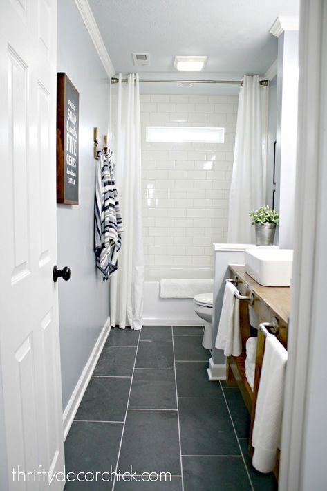 Small Bathroom Look Bigger, Subway Tile Showers, Thrifty Decor Chick, Thrifty Decor, Large Tile, Modern Farmhouse Bathroom, Black Floor, Bathroom Floor Tiles, Shower Design