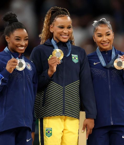 OMG This was the first black podium in Olympic gymnastics history! Our Simone Biles took the silver at the women’s floor gymnastic final and Rebeca Andrade from Brazil won the gold one. In any case, we’re proud of all of them. During the latest artistic gymnastics event, Rebeca Andrade became the most decorated Olympic medalist […] Gymnastics History, Gymnastics Events, French Curl Braids, Curl Braids, Graphic Eyes, French Curl, Allure Magazine, 2024 Olympics, Usa Gymnastics