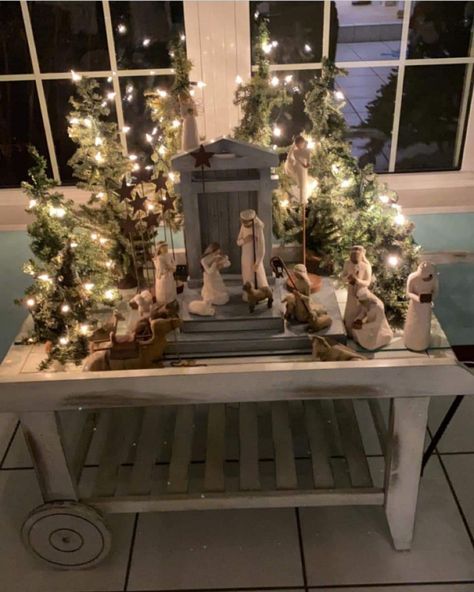 Nativity Village Display, Christmas Manger Decor, Indoor Manger Scene, Nativity Scene Table Decor Ideas, Willow Nativity Display Ideas, Nativity Scene Set Up Ideas, Ways To Display Nativity Scene, Small Nativity Set Display Ideas, Nativity Under Christmas Tree