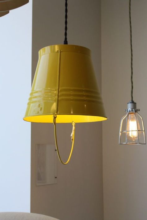 This whimsical pendant light is also from Pedersen & Lennard of Cape Town South Africa. The galvanized steel bucket is powder-coated and also comes in red, yellow, white and black. Ceiling Lights Diy, Lampe Metal, Bucket Light, Light Wall Art, Creative Bathroom, Diy Light Fixtures, Cafe Shop Design, Diy Ceiling, Lighting Concepts