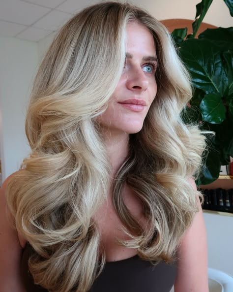 No better way to start the week than with a perfect bouncy blowout 💁‍♀️ Color and style by @sum.styles #denverblonde #denverblondespecialist #dysonairwrap #dysonblowout #blowout #denverhair #denverhairstylist #denverhairsalon Prom Hair Down Blowout, Bridal Hairstyles Curls Down, Bridesmaid Blowout Hair, Blowout With Soft Curls, Blown Out Bridal Hair, High Volume Blowout, Drybar Blowouts Hairstyles, Bride Hair Blowout, Middle Part Bouncy Curls