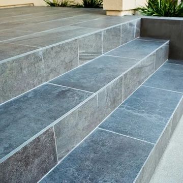 Tile Porch Steps, Tiling Front Door Steps, Front Steps Tile Ideas, Outdoor Porch Tiles Front Steps, Tile Front Steps, Front Door Tile Entryway Exterior, Tiled Steps Indoor, Tiles For Porch Floor, Tile Stairs Outdoor Front Steps