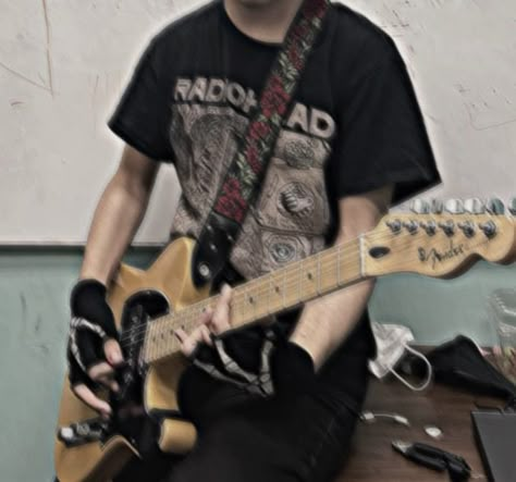 alt boy holding a guitar wearing a radiohead shirt Rockstar Man Aesthetic, Guitar Band Aesthetic, Men With Guitar Aesthetic, Rockstar Boy Aesthetic, Band Boy Aesthetic, Rock Boy Aesthetic, Band Aesthetic Rock, Guitarist Boy, Guy Guitar Aesthetic