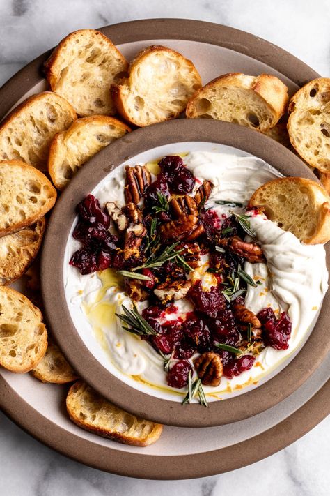 Whipped Goat Cheese with Cranberries & Pecans - Cooking with Cocktail Rings Goat Cheese With Fig Jam And Pecans, Whipped Goat Cheese With Bacon & Dates, Christmas Party Bites, Fig Preserves Appetizers, Goat Cheese And Cranberry Appetizer, Cranberry Goat Cheese Recipes, Goat Cheese Side Dish, Goat Cheese Board Ideas, Goat Cheese Fig Jam Appetizer