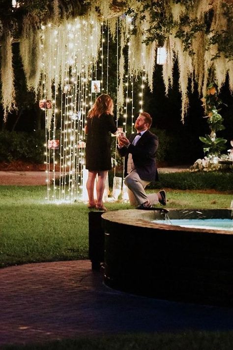 24 Best Proposal Ideas For Unforgettable Moment ❤️ best proposal ideas fairy tale night time proposal ideas with lights on trees near fountain ❤️ See more: https://ohsoperfectproposal.com/best-proposal-ideas/ #bridalsets #diamondrings #weddingringsforwomen #proposalideas #ohsoperfectproposal Romantic Outdoor Proposal Ideas, Night Proposal Ideas, Backyard Proposal Ideas Night, Outdoor Proposal Ideas, Best Proposal Ideas, Outdoor Proposal, Unique Proposals, Proposal Pictures, Wedding Alters