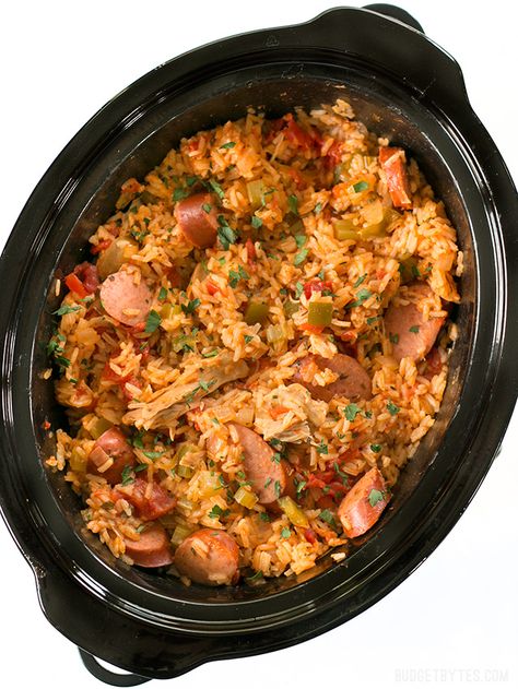 Slow Cooker Jambalaya has all the big flavor of the classic Louisiana dish with half the effort. BudgetBytes.com Crockpot Jambalaya, Quick Slow Cooker Meals, Slow Cooker Jambalaya, Chicken Crockpot Recipes Healthy, Chicken Crockpot Recipes Easy, Delicious Slow Cooker Recipes, Skillet Dishes, Jambalaya Recipe, Crock Pot Recipes