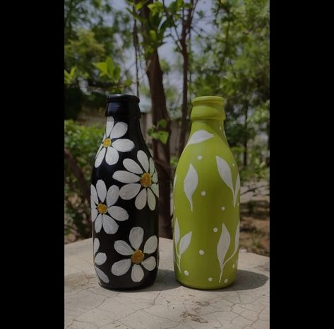 Acrylic painting on glass bottle Acrylic Glass Bottle Painting, Glass Bottle Painting With Acrylic Paint, Bottle Art Flower Designs, Pot Panting Design Easy, Acrylic Painting On Bottles, Glass Bottle Painting Designs Easy, Hajmola Bottle Diy, Bottle Painting Ideas Acrylics Easy, Glass Bottle Painting Acrylics