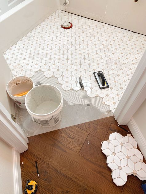 Small Bath Tile Floor, Updated Hall Bathroom, Tan Hexagon Tile Bathroom, Tiled Bathroom Renovation, Tile On Tile Bathroom, Cute Bathroom Tile Floors, Decorative Floor Tile Laundry Room, Pink Accent Tile Bathroom, Bathroom Floor Tile With Dark Grout