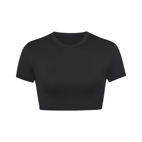 The signature SKIMS cropped tee, now available as the perfect cover-up or t-shirt swim top. This short sleeve, crewneck top can be worn alone or layered over bikini tops for added coverage or versatile styling. Size down for a tighter fit. | SKIMS T-Shirt | Black | Small | Signature Swim Affordable Basic Nike T-shirt, Cheap Sporty Heather Grey T-shirt, Cheap Cotton Sportswear T-shirt, Cheap Urban Top With Relaxed Fit, Cheap Solid Color Sporty T-shirt, Cheap Basic Nike T-shirt, Cheap Brown Sporty Tops, Cheap Summer Sportswear T-shirt, Cheap Crew Neck Crop Top For Streetwear