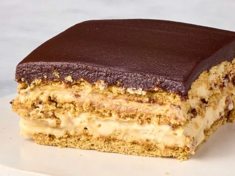 Peanut Butter Chocolate Éclair Cake (No-Bake) | The Kitchn Peanut Butter Delight Recipe, Peanut Butter Eclair Cake, Peanut Butter Eclair, Chocolate Layer Dessert, Chocolate Eclair Cake, Caramel Apple Dump Cake, Pastry Stand, Pastry Cream Filling, Double Chocolate Muffins