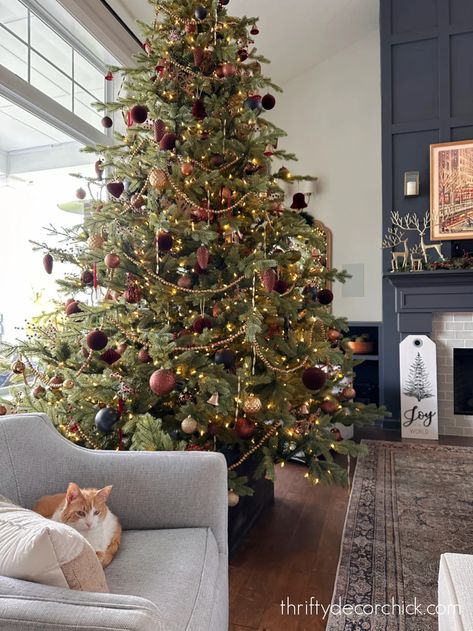 Chris Loves Julia Christmas Tree, Moody Boho Christmas, Christmas Tree Dark Academia, Christmas Tree Tall Ceilings, Droopy Christmas Tree, Muted Color Christmas Tree, Cranberry Christmas Tree Decorations, Copper Gold Christmas Tree, Red And Green And Gold Christmas Tree