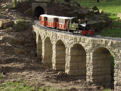 Garden Train, Garden Trains, Coffee In Hand, Old Bridges, Garden Railroad, Model Railway Track Plans, Garden Railway, Railway Bridges, Model Train Layouts