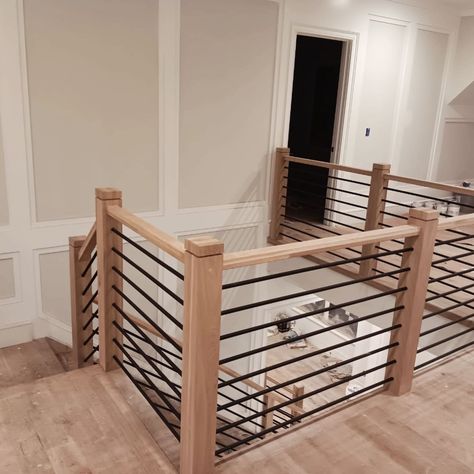 🌊 Introducing the latest gem in our Ocean Stair Rails collection: A sleek blend of functionality and style, featuring a modern horizontal black metal railing. Paired with sturdy metal balusters and topped with a luxurious wood rail, this design is framed by square posts that exude contemporary elegance. 🖤🪵 The contrast of black metal with the warmth of wood brings a unique aesthetic to any space, harmonizing with both modern and traditional interiors. This project not only elevates the home’... Black Metal Railing, Black Stair Railing, Indoor Railing, Metal Balusters, Stair Rails, Metal Railing, Black Stairs, Wood Railing, Metal Railings