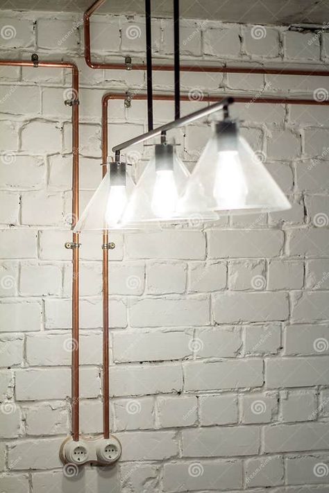 A Vintage Outlet and Electrical Wiring in a Copper Tube. Stock Image - Image of copper, closeup: 109117261 Conduit Lighting, Old Home Renovation, Eclectic Industrial, Copper Tube, Beach Cottage Decor, Industrial Wall Lights, Copper Tubing, Electrical Wiring, Pool House