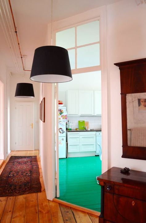 A Berlin Kitchen With a Glossy Green Floor | Kitchn Kitchen Green Floor, Kitchen Spotlights, Classic Apartment, Chambre Inspo, Painted Wood Floors, Berlin Apartment, Green Floor, Kitchen Green, Global Home