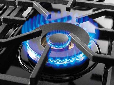 The best way to clean a stove top may be with warm, soapy water, or with baking soda for large messes. Allow all parts to air dry before you reassemble the stove. Flame Picture, Black Appliances, Gas Stove, Soapy Water, Stove Top, Air Dry, A Black, Cleaning Hacks, Baking Soda