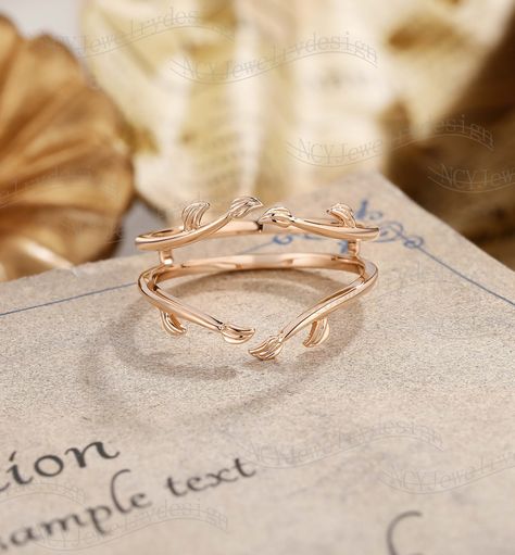 Wedding Band Details Leaf Wedding Band, Enhancer Wedding Band, Solid Rose Gold Ring, Branch Ring For Women, Wrap Ring, Plain Wedding Band, Stacking Wedding Band Ring#: NC16314 Plain Solid Gold Custom orders are most welcome! Please feel free to ask for any item, any adjustments or anything else you want me to make. Rush order Orders can be expedited for a fee. If your order needs to be expedited, please contact us ASAP. Layaway plan We offer layaway plan that works with a $100 as the first payment, and all payment plans have to be paid in FULL within 6 months after the first payment. How does it work: 1) Message us the link to your favorite ring，your finger size，the metal and how much you would like to do for the first payment. 2) We will set up your payment link and send it to you. 3) Aft Plain Rose Gold Wedding Band For Women, Ethereal Wedding Band, Whimsical Wedding Band, Wrap Around Wedding Band, Vine Wedding Band, Branch Wedding Band, Floral Wedding Band, Wedding Band Tattoo, Leaf Wedding Band