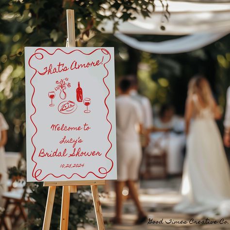 That's Amore! Bridal Shower Welcome Sign ~ Canva Template A romantic and charming celebration inspired by the elegance and passion of Italy - That's Amore themed bridal shower welcome sign. This theme encapsulates the essence of Italian romance, providing a beautiful and intimate setting for celebrating the bride-to-be. It's all about love, laughter, and la dolce vita, making it a truly memorable and special occasion. Please read before purchase: This is a fully editable, do-it-yourself Canva Te Italian Dolce Vita, Italian Romance, Bridal Shower Welcome Sign, Shower Welcome Sign, Create Invitations, Whimsical Illustration, Bridal Shower Theme, Diy Invitations, Hand Written