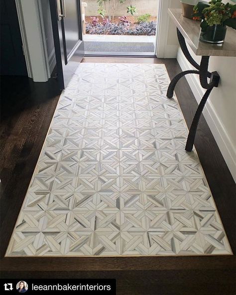 Absolutely loving this tile "rug" design by  @leeannbakerinteriors #repost  For this #mercerislandproject we debated putting an entry rug over the wood floor but my clients wanted something that could handle wet shoes and umbrellas without worry. We opted for this amazing mosaic from @annsacks and transitioned it to the wood floor with a brass inlay strip. It is beautiful durable and seamless and no worrying about whether or not it will fit under the door! #annsacks #designdetails #entryway #flo Tile Rug Inlay, Tile Inlay, Entryway Tile, Foyer Flooring, Entry Tile, Entryway Flooring, Ann Sacks, Runner Rug Entryway, Tile Rug