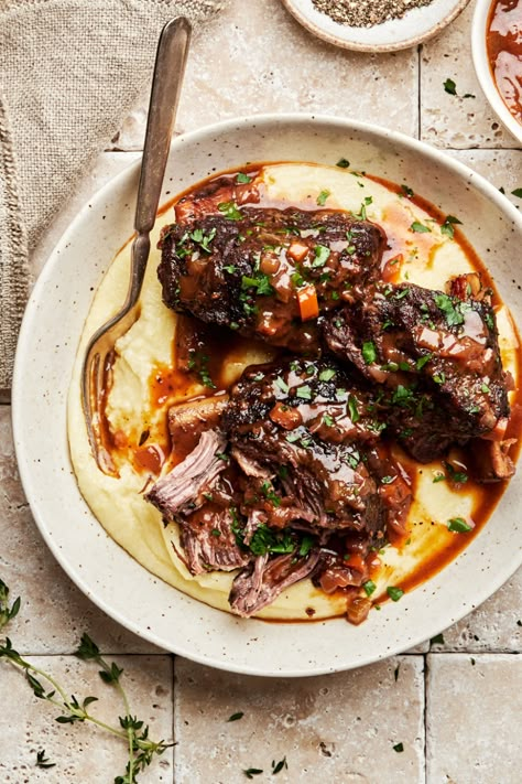 We’ve got you covered with this comforting and hearty short rib recipe so tender you won’t be able to stop yourself from devouring them all in one sitting. Recipes With Beef Short Ribs, Ribs Recipes Oven, Beef Short Ribs Slow Cooker, Beef Short Ribs Instant Pot, Short Ribs Recipes, Short Ribs Instant Pot, Sous Vide Recipes Beef, Best Short Rib Recipe, Braised Short Ribs Recipe