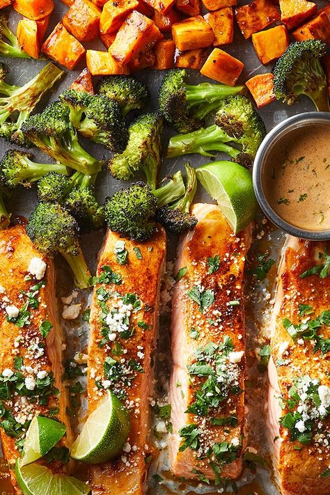 This Sheet Pan Salmon with Sweetpotatoes and Broccoli is easy-to-make and bursting with flavor and good-for-you nutrition. We❤️ it! Thank you Eating Well Magazine! #sweetpotato #salmon #sheetpandinner