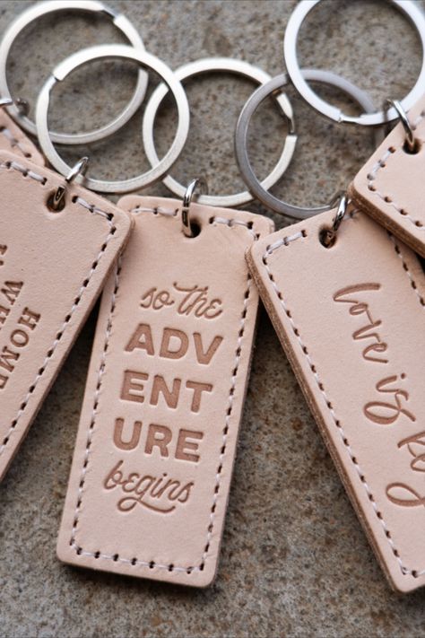 NATURAL LEATHER KEYCHAINS FOR WEDDING AND EVENT FAVORS | LETTER + LEATHER | Love is key 🔑 Combine heat stamping and natural leather and get a refined, classy and practical gift for your wedding, event or adventure! Prefer a luggage tag instead? Check out our other listings to find tags! Hotel Keychain Wedding Favor, Personalized Keychain Wedding Favors, Leather Keychain Wedding Favor, Keychain Wedding Favors, Leather Keychain With Key Clip As Gift, Leather Keychains With Key Leash For Everyday Use, Leather Keychains, Key Keychain, Event Favors