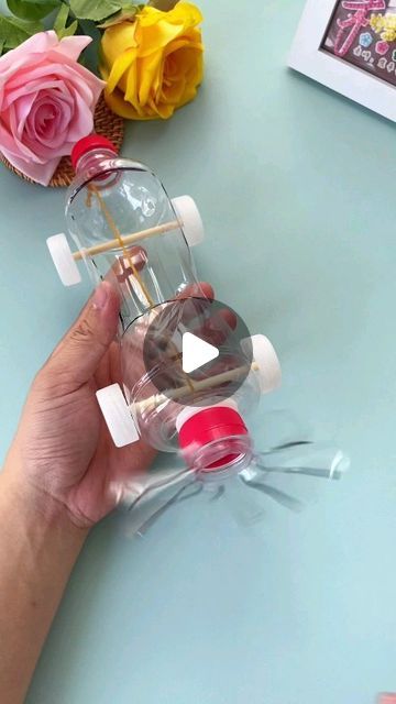 Creative Ideas on Instagram: "Transform an ordinary water bottle into a fun and functional toy car! Follow along as we guide you through the steps to create your own water bottle car. From assembling the wheels to adding finishing touches, watch as this simple DIY project turns recycled materials into a creative and entertaining toy. Perfect for kids and adults alike, this activity combines creativity, sustainability, and fun!" Diy Toys Easy, Diy Recycled Toys, Recycling Projects For School, Recycled Material Art, Ecofriendly Crafts, Craft Ideas Paper, Recycling Activities, Water Bottle Crafts, Recycle Water Bottles